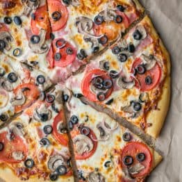 A California pizza cut into five slices