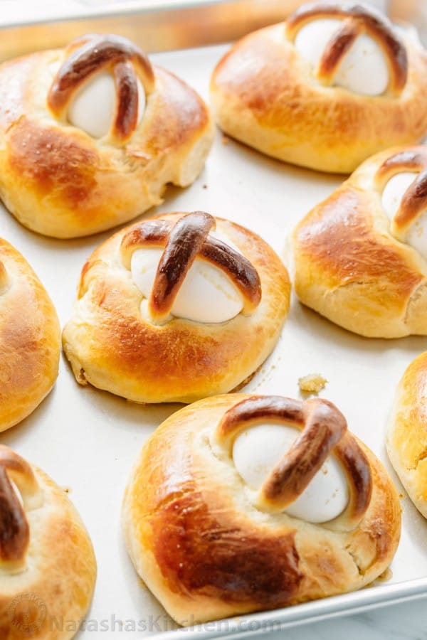 This Easter Breads recipe produces a billowy soft, golden and lightly sweet Easter bun with a perfectly cooked egg. Beautiful way to share the Easter story!