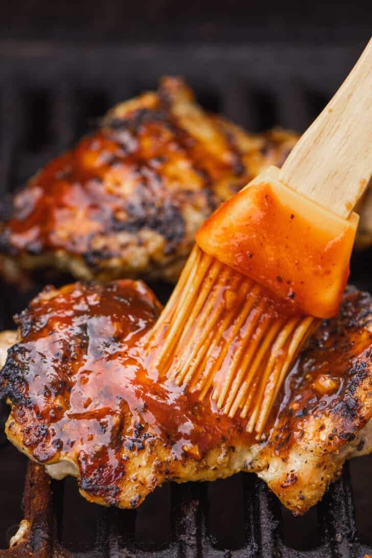Not only is this homemade BBQ sauce the best you'll ever have, it's also much cheaper than buying it at the store. So easy to make, too! Brushing BBQ sauce onto chicken while it grills