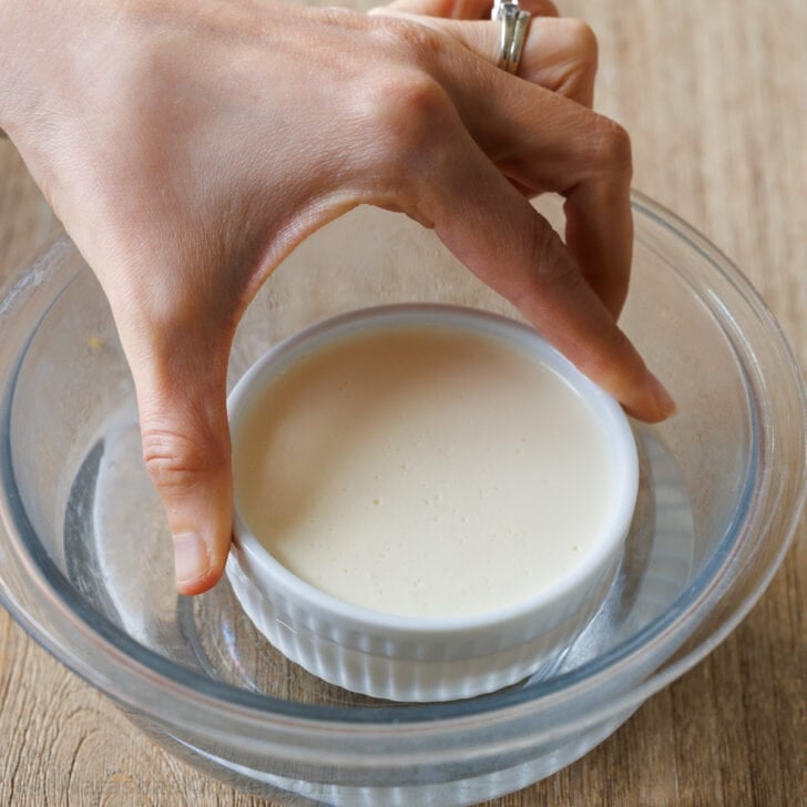 Panna Cotta is a quick and easy Italian dessert. The fresh berry sauce gives every creamy spoonful the perfect balance of sweet and tangy. Dip the ramekins in warm water for 5-10 seconds
