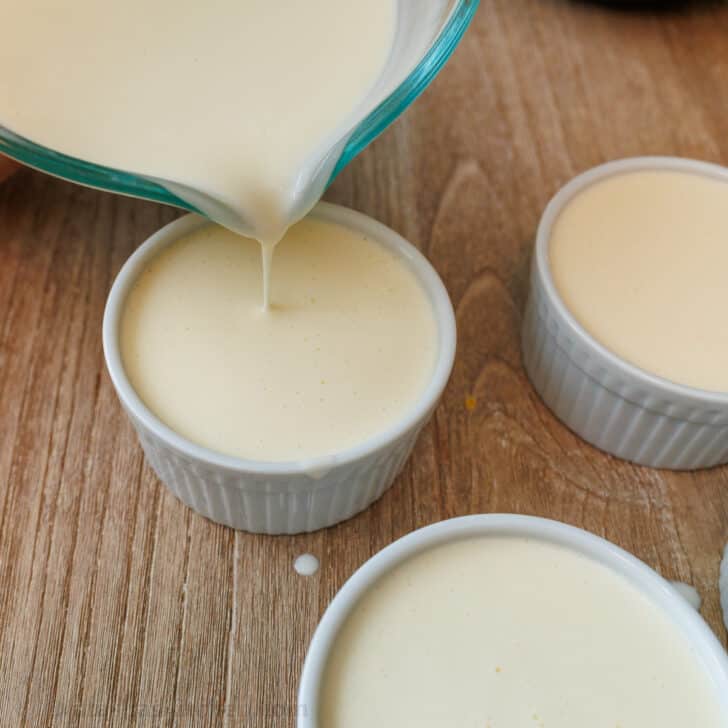 Panna Cotta is a quick and easy Italian dessert. The fresh berry sauce gives every creamy spoonful the perfect balance of sweet and tangy. Pouring the Panna Cotta mix into ramekins