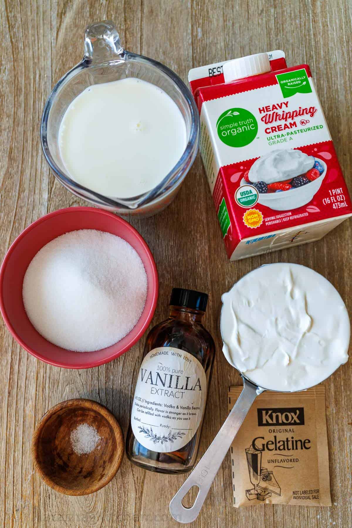 Ingredients for homemade Panna Cotta: milk, heavy whipping cream, sour cream, vanilla, salt, gelatin, sugar, and milk. Panna Cotta ingredeients: Milk, heavy whipping cream, sour cream, sugar, vanilla, gelatin, salt