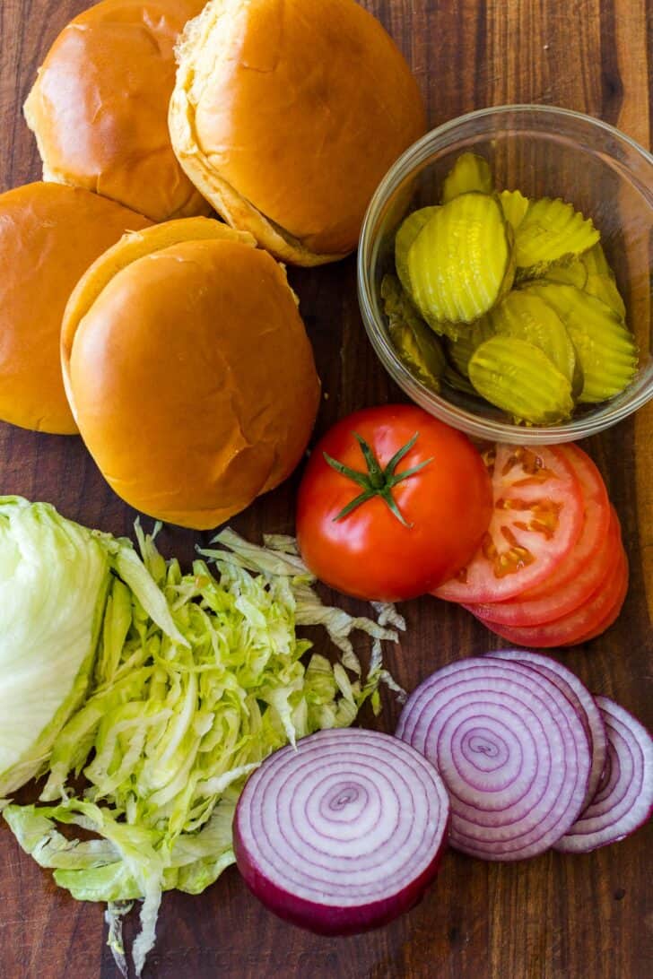 A restaurant-style Smash Burger is one of the tastiest ways to cook a burger. You’ll love the double patty with melted cheese in between. Smashburger toppings with buns, lettuce, tomatoes, pickles and onions