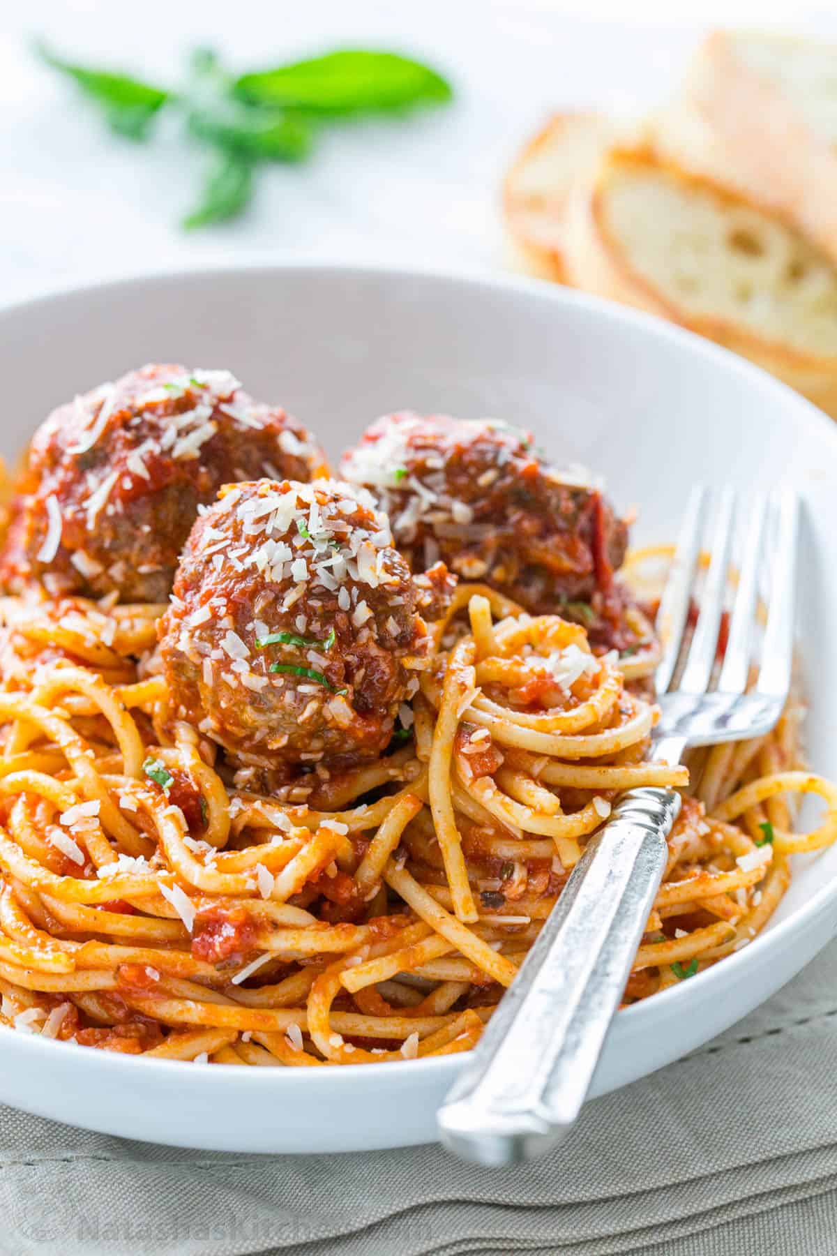 The best Spaghetti and Meatballs recipe, with big juicy meatballs and spaghetti in a homemade marinara sauce for an easy weeknight dinner.